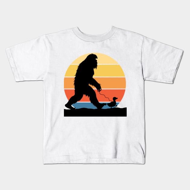 Bigfoot Walking with a Duck Gradient Sunset Kids T-Shirt by FlippinTurtles